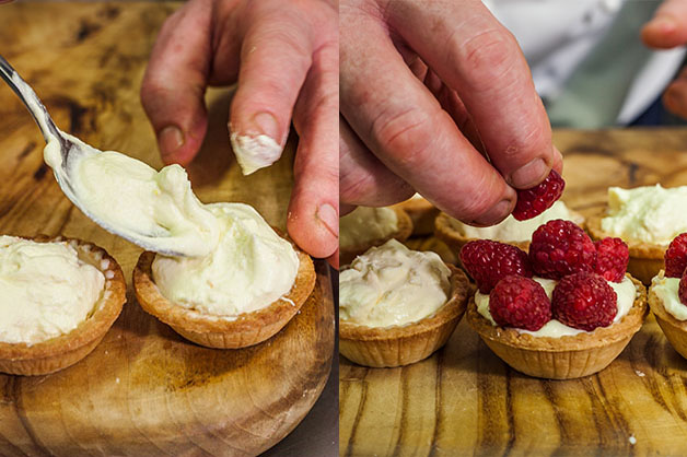 Filling the tartlet and placing raspberries on top