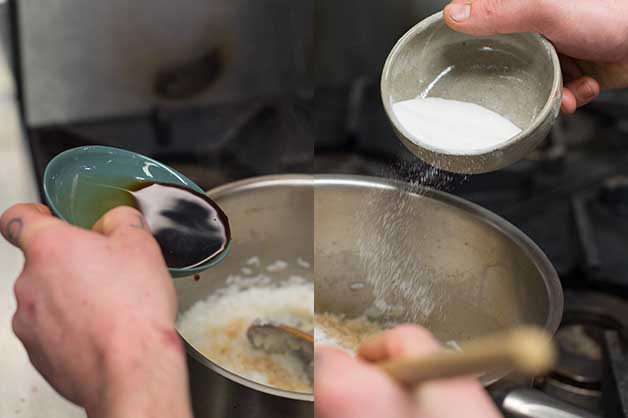 Chef adding ingredients to the boiling rice