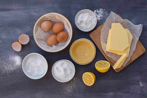 The photo shows all of the ingredients for the lemon curd tartlets
