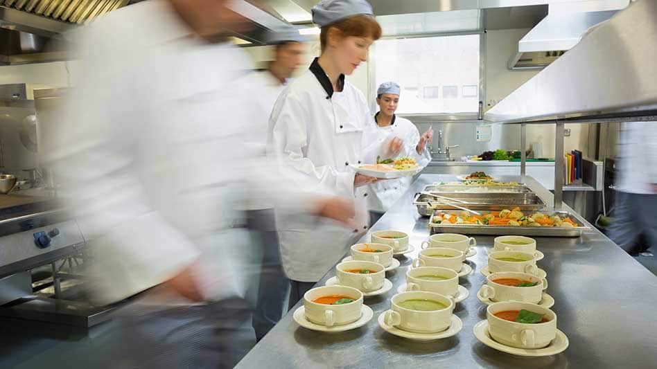 A photo showing chefs working in the kitchen