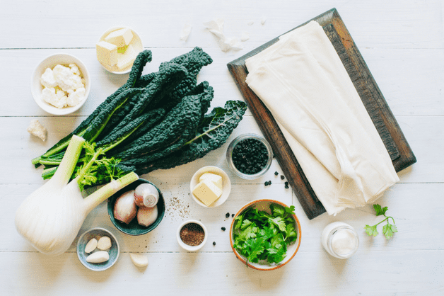 Ingredients on a table for Spanakopita
