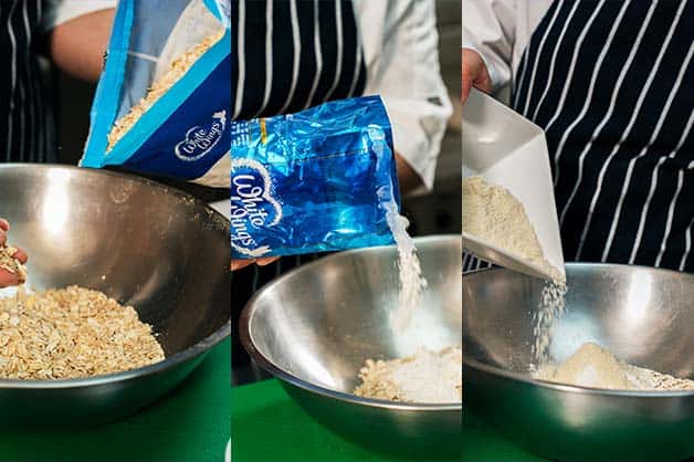 The chef is seen creating the crumble with White Wings Rolled Oats