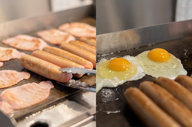 Photo shows the chef frying the sausages, bacon and eggs