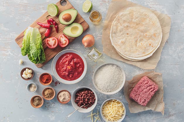 Raw ingredients for the burrito recipe are pictured