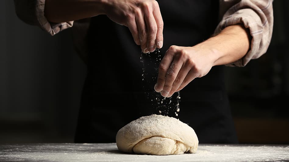 Image of a chef doing some gluten free baking